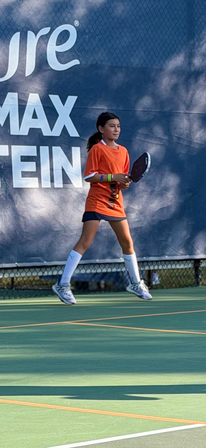 LaMakina tournament player wearing the Performance Tee